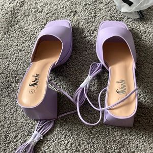 Purple broad heel shoes